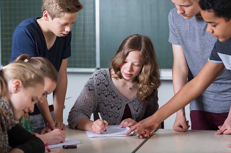 Students helping each other