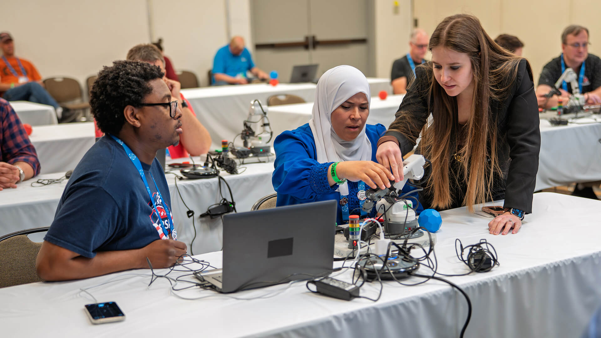 Conference attendees exploring VEX classroom tools in a workshop.
